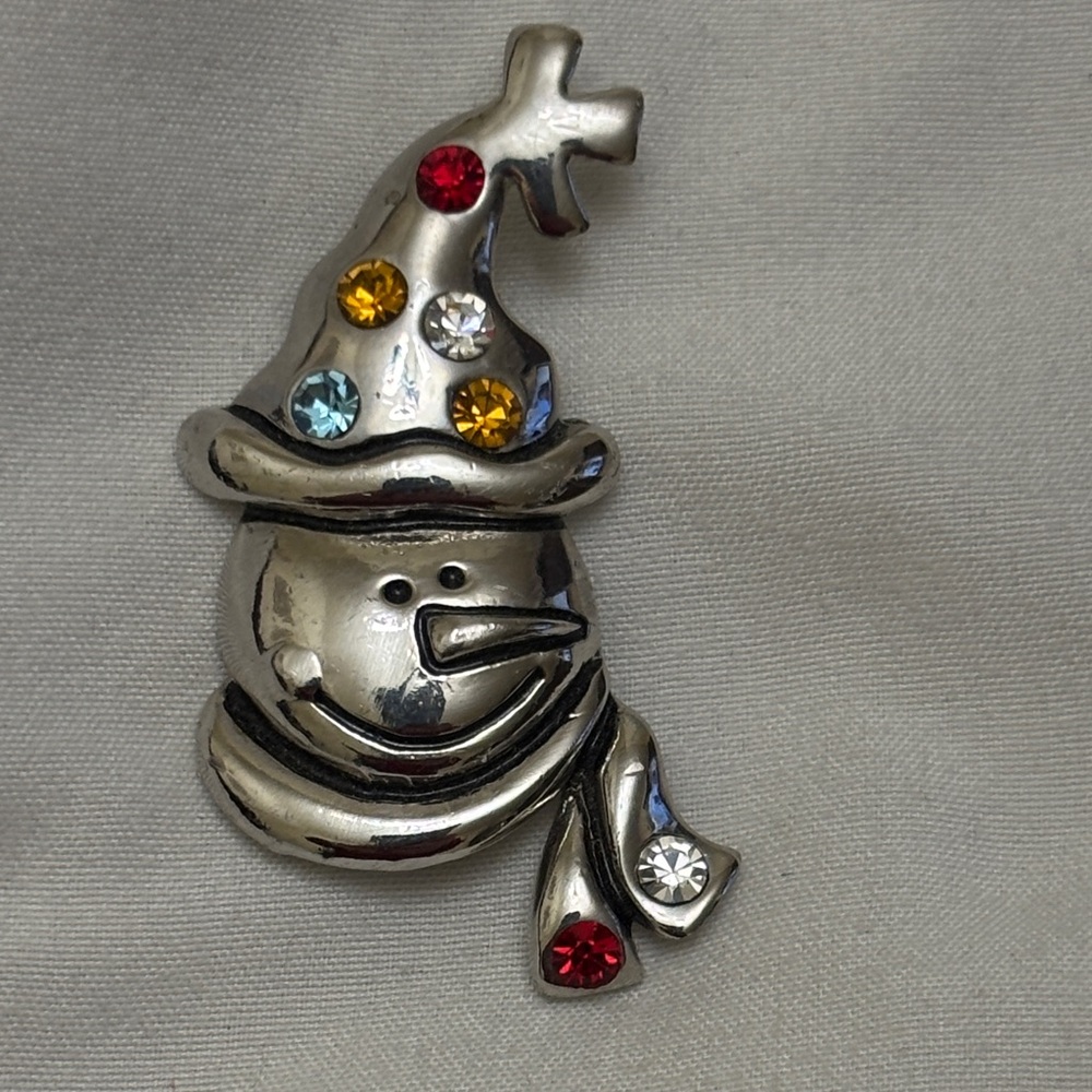 snowman brooch silver tone
multicolor rhinestones
